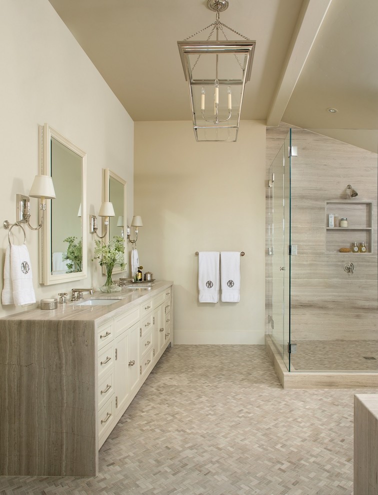 На фото: главная ванная комната в классическом стиле с врезной раковиной, фасадами с утопленной филенкой, бежевыми фасадами, бежевыми стенами, угловым душем и полом из мозаичной плитки