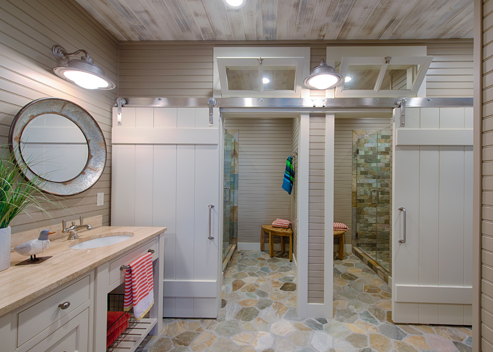 Стильный дизайн: детская ванная комната в морском стиле с фасадами с декоративным кантом, бежевыми фасадами, душем в нише, разноцветной плиткой, каменной плиткой, бежевыми стенами, врезной раковиной, столешницей из дерева, разноцветным полом, душем с распашными дверями и бежевой столешницей - последний тренд
