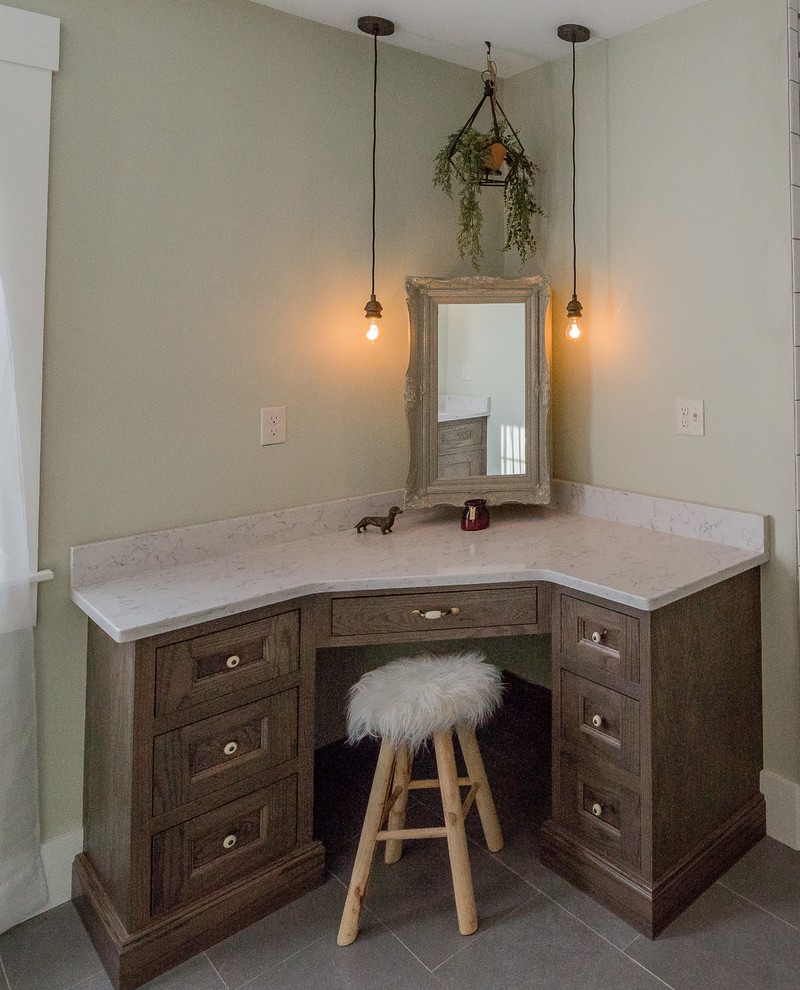Inspiration for a cottage bathroom remodel in Boston with recessed-panel cabinets