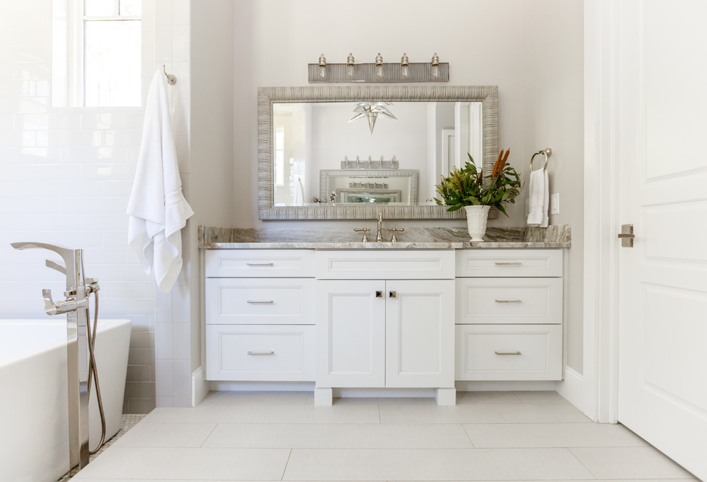Bathroom - large eclectic master white tile and subway tile porcelain tile bathroom idea in Jacksonville with shaker cabinets, white cabinets and quartzite countertops