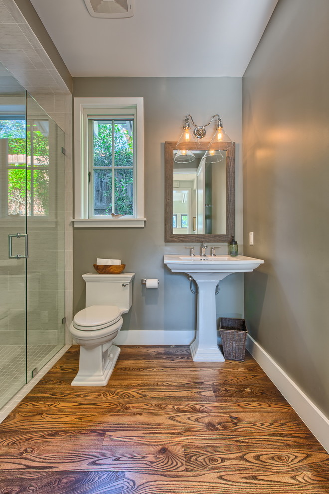 Example of a huge 3/4 white tile light wood floor walk-in shower design in Los Angeles with a two-piece toilet, gray walls and a console sink