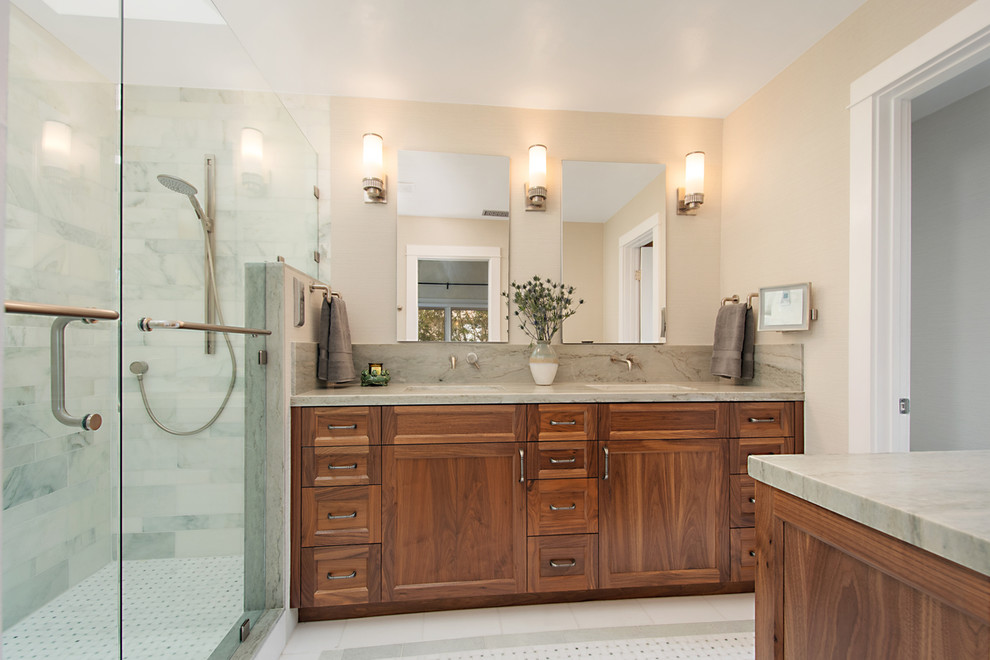 Medium sized classic ensuite bathroom in San Diego with shaker cabinets, medium wood cabinets, a one-piece toilet, marble tiles, marble flooring, a hinged door, a double shower, green tiles, green walls, a submerged sink, quartz worktops, green floors and green worktops.