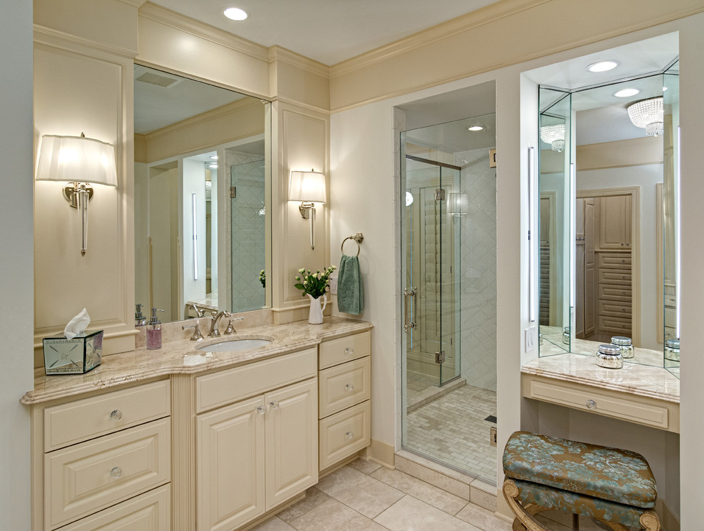 Photo of a large classic ensuite bathroom in Minneapolis with raised-panel cabinets, beige cabinets, a hot tub, a walk-in shower, white tiles, ceramic tiles, white walls, porcelain flooring, a submerged sink and granite worktops.