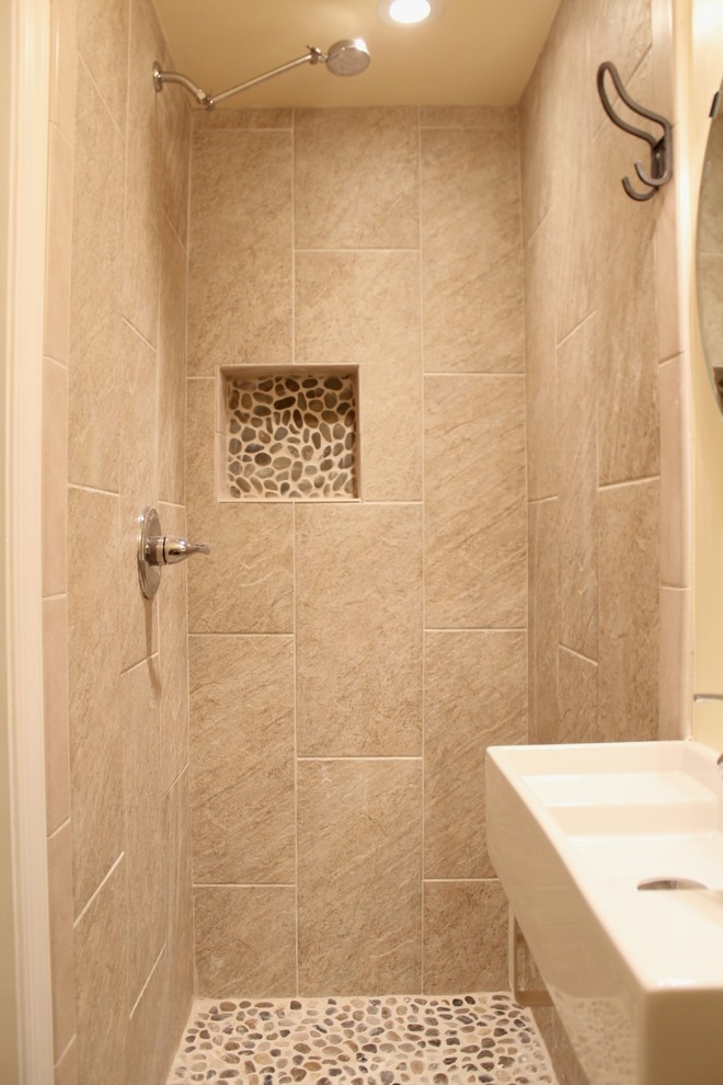 Example of a small trendy beige tile and ceramic tile ceramic tile corner shower design in Houston with a wall-mount sink, a two-piece toilet and yellow walls