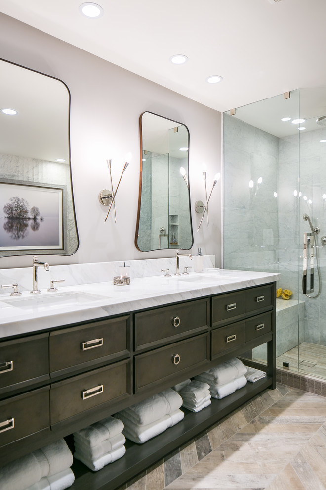 Bathroom - mid-sized modern master white tile and stone tile ceramic tile and gray floor bathroom idea in Denver with recessed-panel cabinets, dark wood cabinets, a one-piece toilet, gray walls, an undermount sink, marble countertops and a hinged shower door