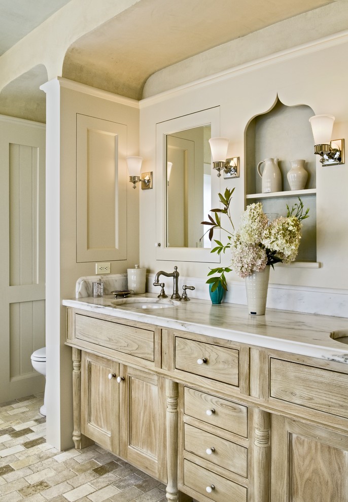 Inspiration for a timeless bathroom remodel in Burlington with marble countertops