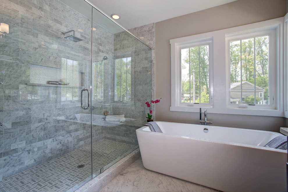 Mid-sized arts and crafts master white tile and stone tile marble floor bathroom photo in DC Metro with raised-panel cabinets, dark wood cabinets, a two-piece toilet, gray walls, an undermount sink and marble countertops
