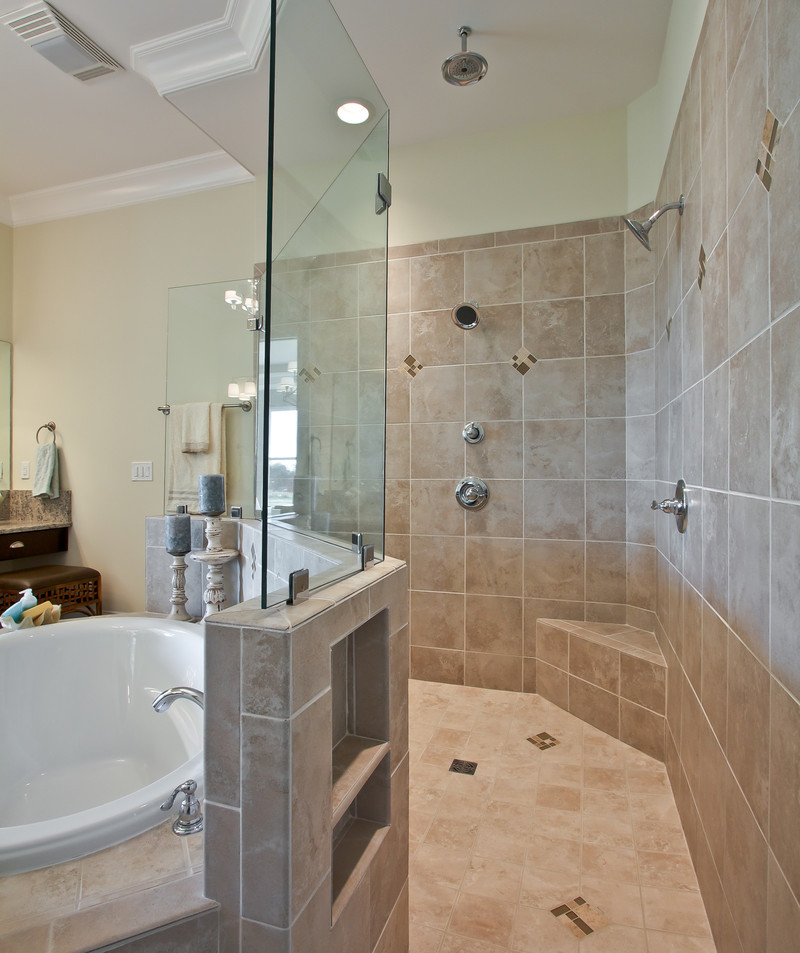 Mid-sized elegant master beige tile and porcelain tile ceramic tile bathroom photo in Nashville with recessed-panel cabinets, dark wood cabinets, a two-piece toilet, beige walls, an undermount sink and laminate countertops