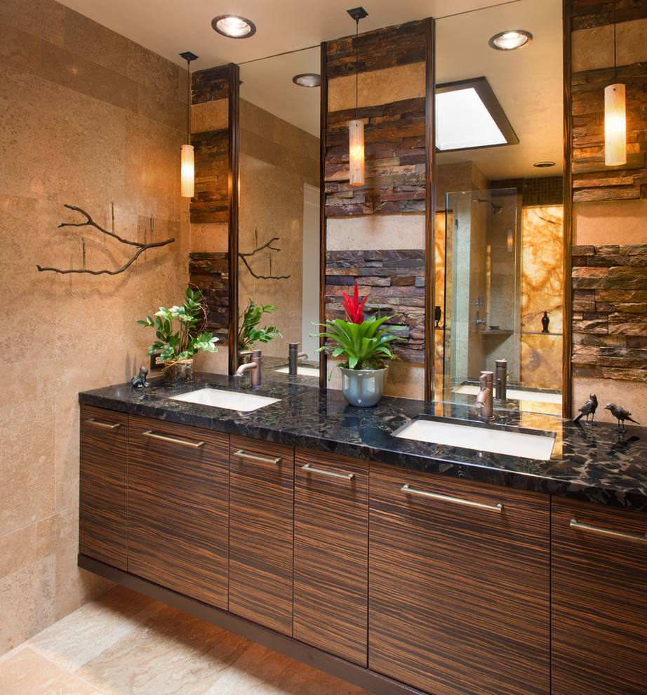 Design ideas for a large contemporary ensuite bathroom in San Diego with a submerged sink, flat-panel cabinets, dark wood cabinets, beige tiles, black and white tiles, a built-in bath, a walk-in shower, stone slabs, beige walls, ceramic flooring, granite worktops and beige floors.