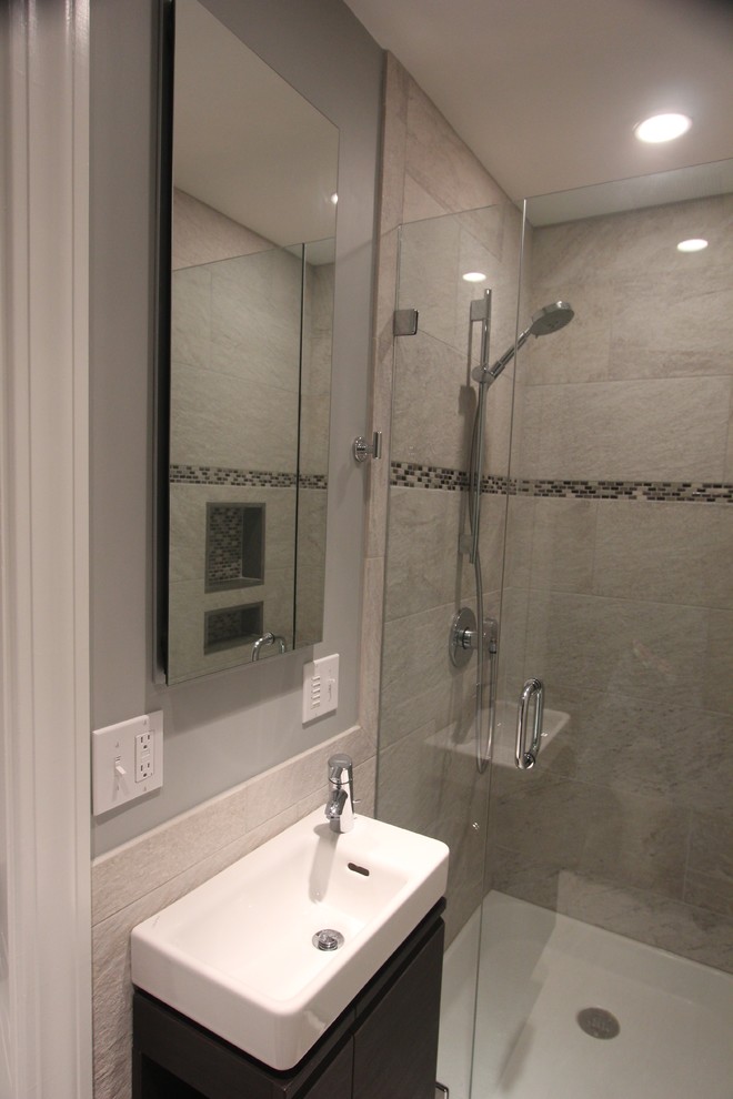 Inspiration for a small master white tile and porcelain tile porcelain tile alcove shower remodel in Boston with a pedestal sink, dark wood cabinets and a one-piece toilet