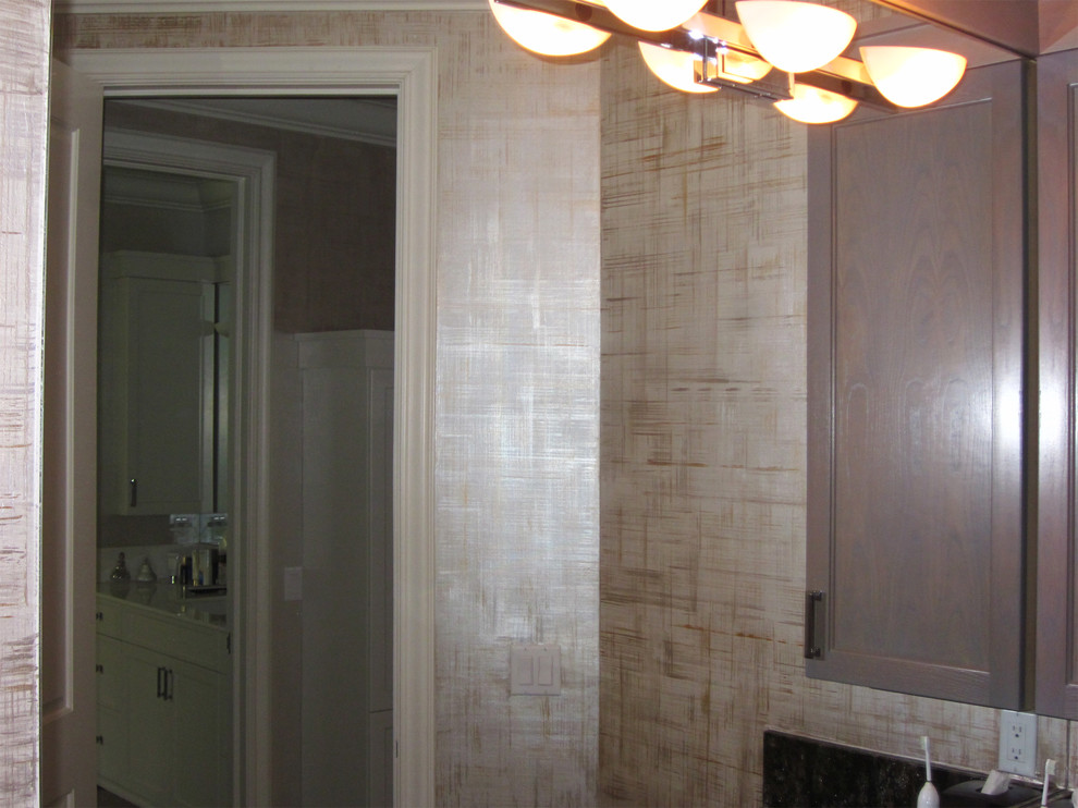 Example of a large minimalist master beige tile and stone tile marble floor doorless shower design in Newark with recessed-panel cabinets, gray cabinets, onyx countertops, beige walls, a trough sink and a one-piece toilet