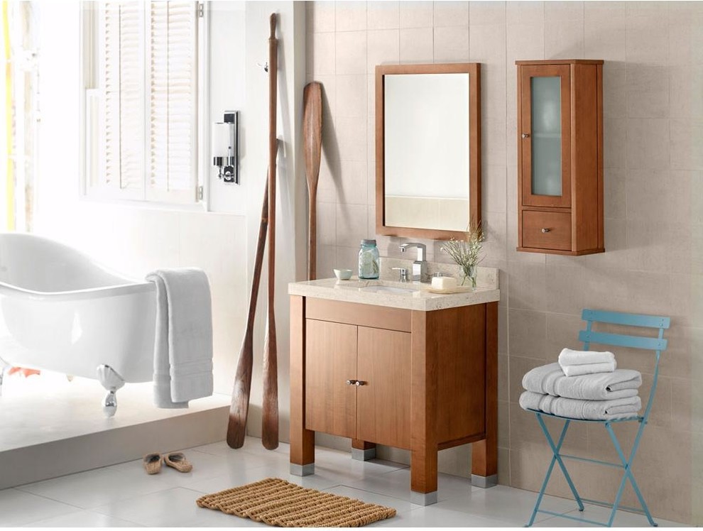 Aménagement d'une salle de bain principale classique en bois brun de taille moyenne avec un placard à porte plane, une baignoire sur pieds, un mur beige, un sol en carrelage de céramique, un lavabo encastré et un plan de toilette en granite.