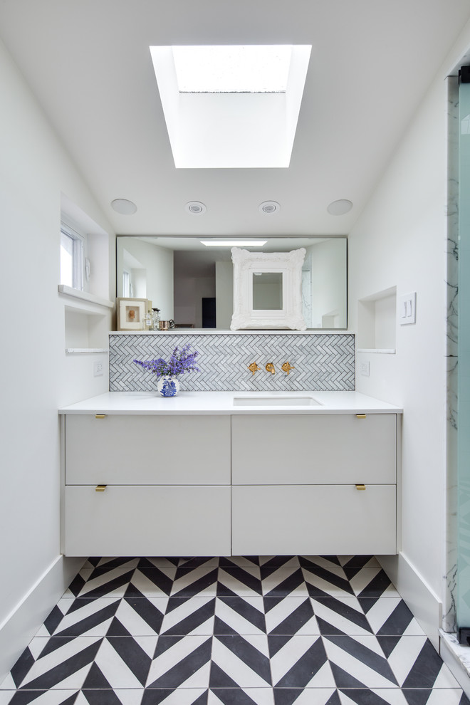 Inspiration for a medium sized contemporary shower room bathroom in Vancouver with flat-panel cabinets, white cabinets, grey tiles, white walls, a submerged sink, black floors, white worktops, a corner shower, marble tiles, engineered stone worktops and a hinged door.