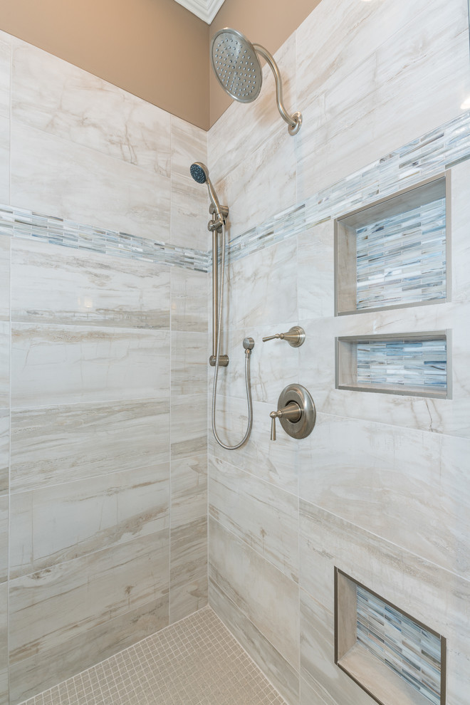 Large transitional master beige tile and porcelain tile porcelain tile and beige floor bathroom photo in Atlanta with an undermount sink, recessed-panel cabinets, white cabinets, beige walls, a hinged shower door, a two-piece toilet and a built-in vanity