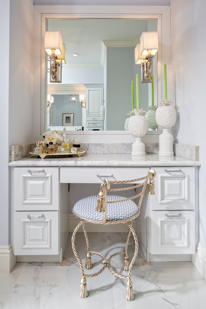 Design ideas for a classic bathroom in Miami with raised-panel cabinets, white cabinets, marble worktops, white tiles, stone tiles, white walls and marble flooring.
