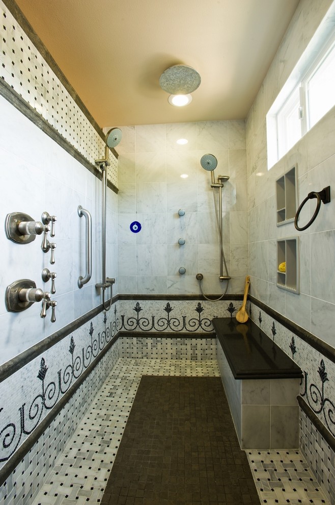 Design ideas for a mediterranean bathroom in Orange County with mosaic tiles.