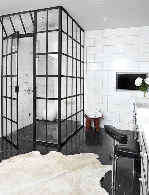 This is an example of a large contemporary ensuite bathroom in Other with a corner shower, white walls and a hinged door.