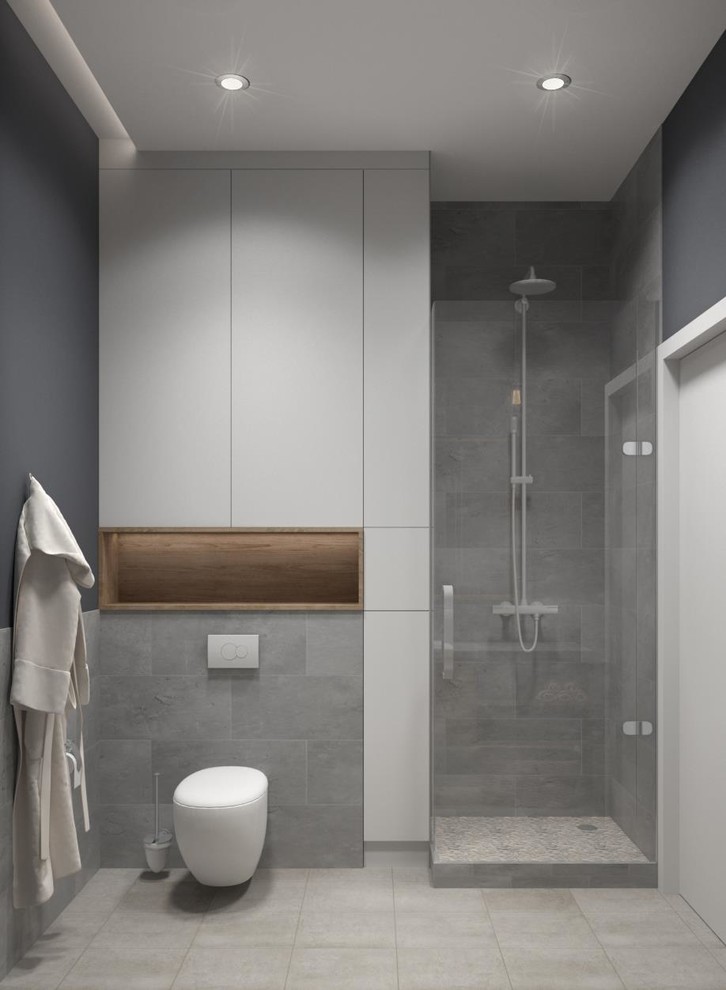 Imagen de cuarto de baño principal nórdico pequeño con baldosas y/o azulejos grises, paredes grises y suelo de baldosas de cerámica