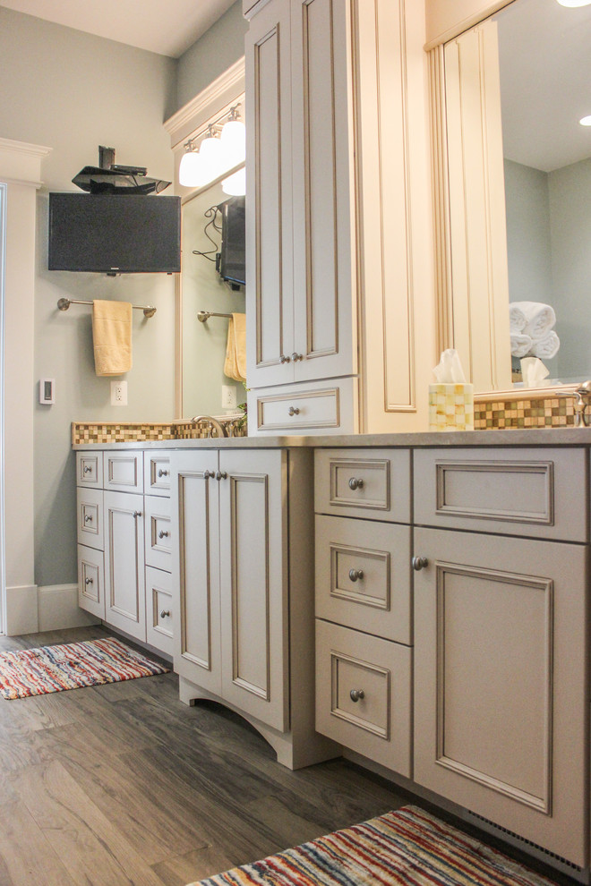 Inspiration for a large timeless master bathroom remodel in DC Metro with raised-panel cabinets