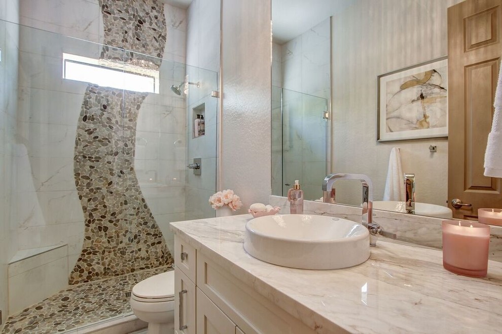 Example of a small eclectic 3/4 white tile and pebble tile porcelain tile alcove shower design in Phoenix with shaker cabinets, white cabinets, a two-piece toilet, gray walls, granite countertops and a vessel sink