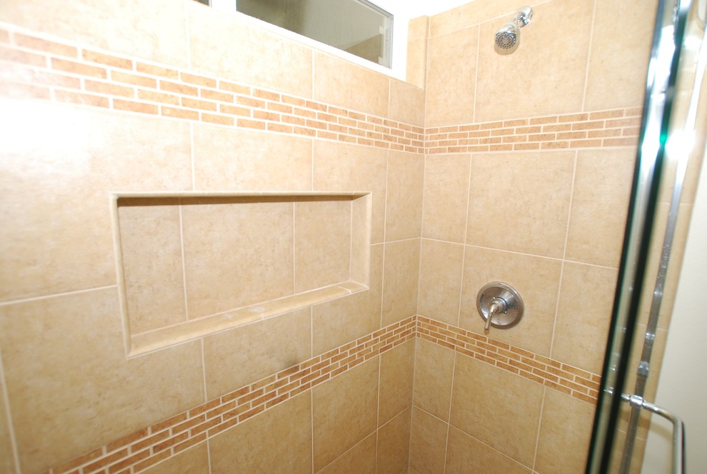Mid-sized elegant kids' beige tile and porcelain tile porcelain tile alcove shower photo in Orange County with an undermount sink, raised-panel cabinets, dark wood cabinets, granite countertops, a two-piece toilet and white walls