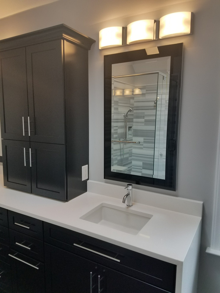 Design ideas for a large modern ensuite bathroom in Other with black cabinets, grey walls, marble flooring, a submerged sink, engineered stone worktops, black floors, white worktops, double sinks and a built in vanity unit.