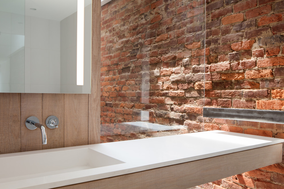 This is an example of a medium sized urban shower room bathroom in Other with open cabinets, light wood cabinets, a built-in shower, white walls, porcelain flooring, an integrated sink, engineered stone worktops, white floors, an open shower and white worktops.