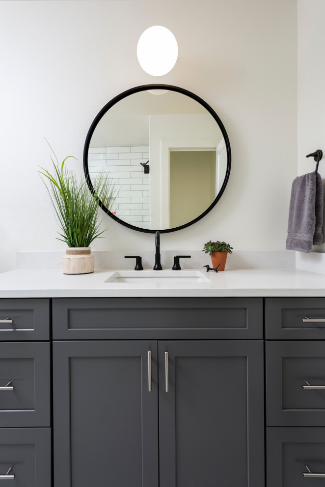 Photo of a small traditional ensuite bathroom in Denver with shaker cabinets, grey cabinets, an alcove shower, a submerged sink, engineered stone worktops, white worktops, a single sink and a built in vanity unit.