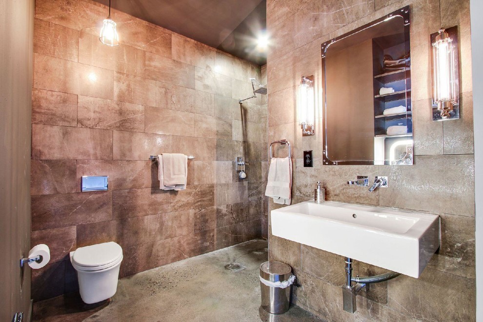 Photo of a medium sized contemporary shower room bathroom in Orange County with open cabinets, distressed cabinets, an alcove shower, a wall mounted toilet, brown tiles, porcelain tiles, brown walls, concrete flooring, a wall-mounted sink, solid surface worktops, grey floors and an open shower.