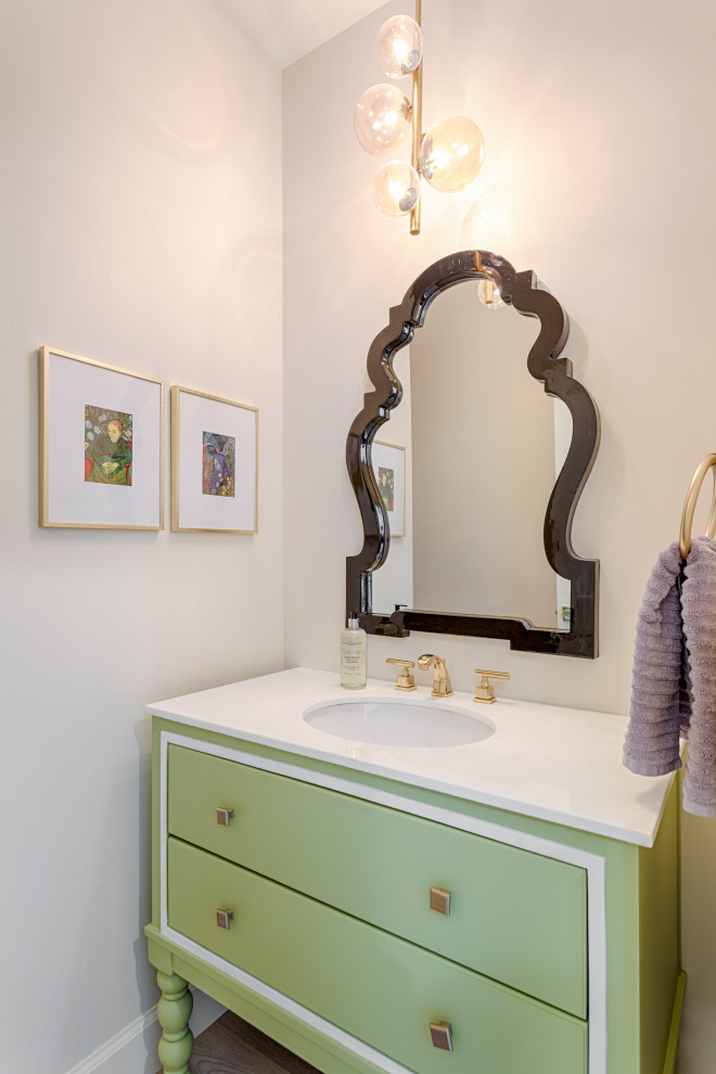 Photo of a medium sized traditional family bathroom in Salt Lake City with freestanding cabinets, green cabinets, a one-piece toilet, white walls, a submerged sink, marble worktops and white worktops.