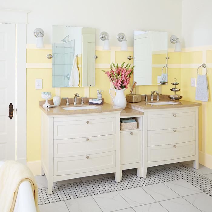 Example of a large transitional master porcelain tile bathroom design in Charlotte with an undermount sink and yellow walls