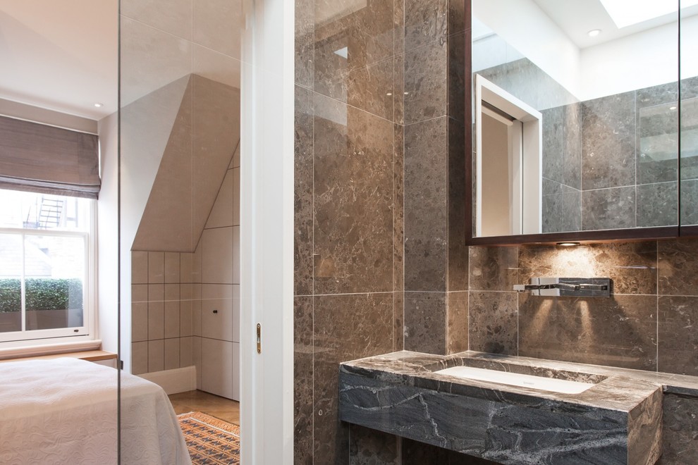 Design ideas for a small contemporary shower room bathroom in London with raised-panel cabinets, black cabinets, a built-in bath, a walk-in shower, a wall mounted toilet, green tiles, ceramic tiles, white walls, marble flooring, a wall-mounted sink, grey floors, a hinged door and white worktops.