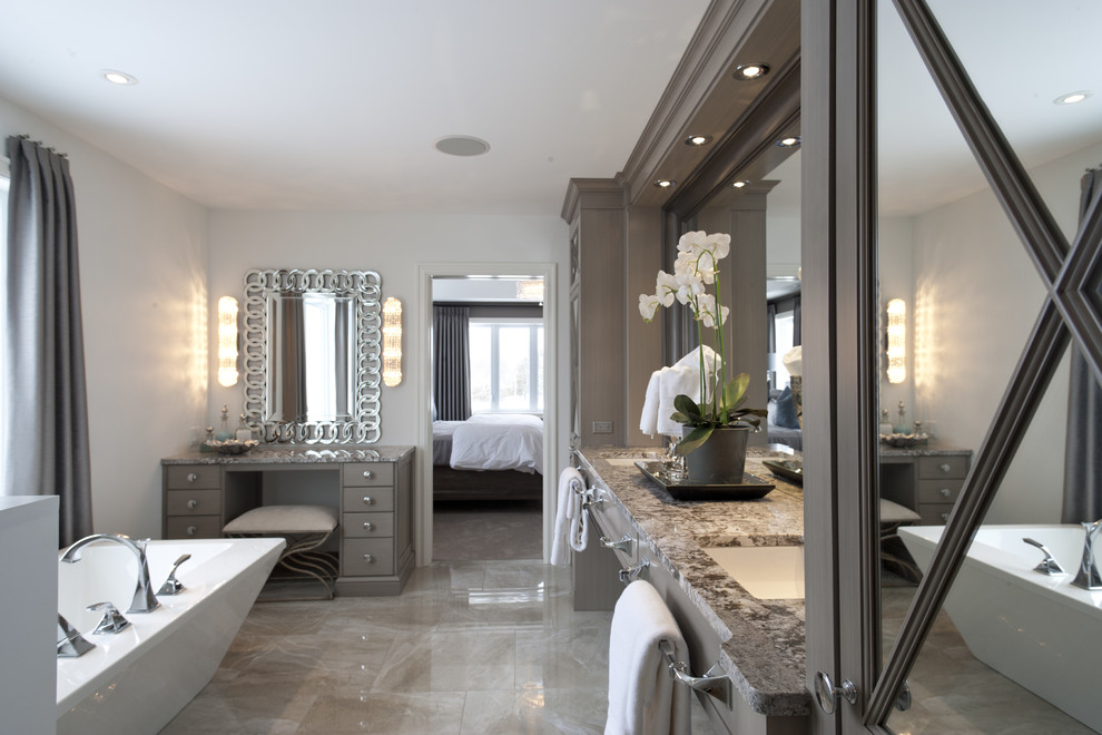 Inspiration for a large timeless master travertine floor bathroom remodel in Toronto with flat-panel cabinets, beige cabinets, white walls, an undermount sink and granite countertops