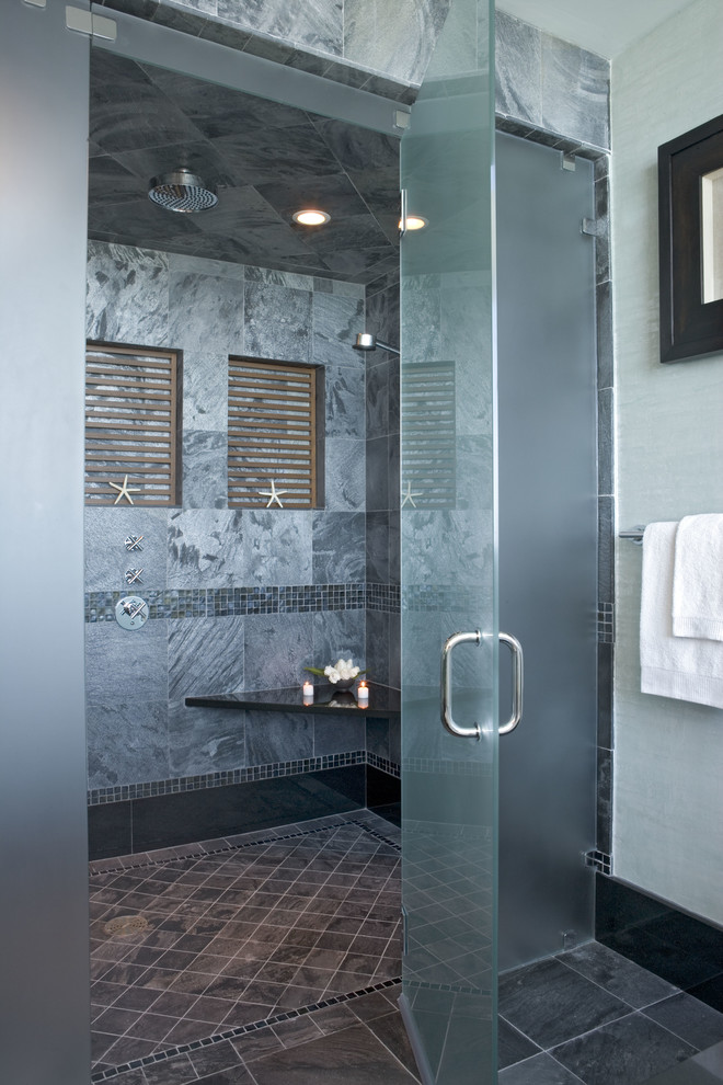 Photo of a nautical bathroom in Philadelphia with a built-in shower and grey tiles.