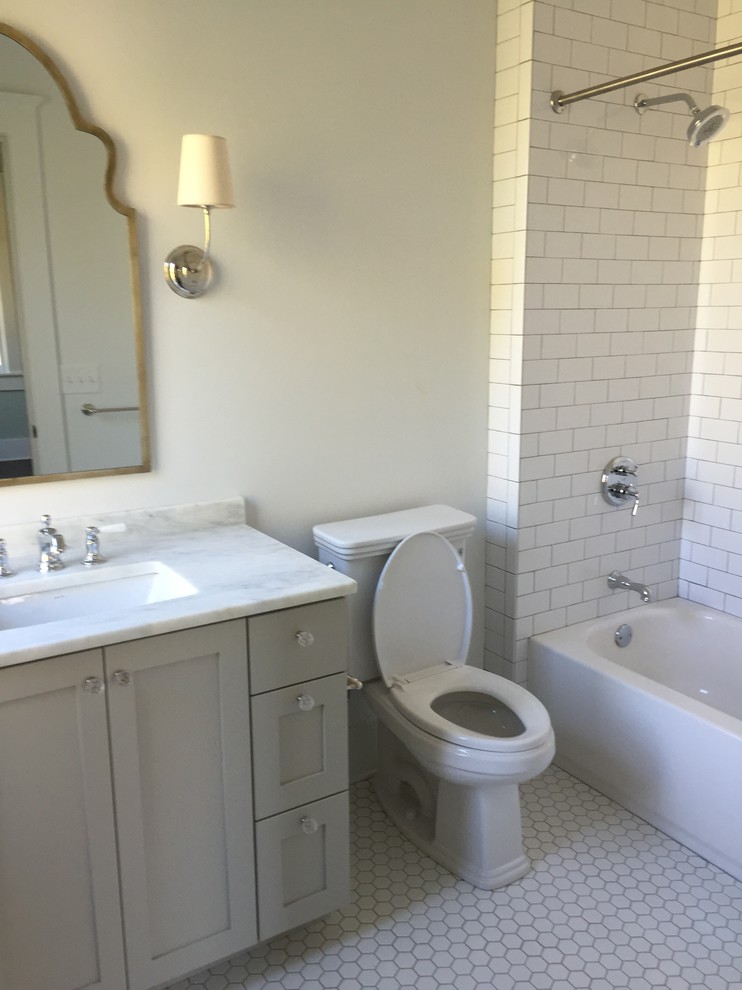 Example of a cottage kids' white tile and subway tile marble floor bathroom design in Atlanta with an undermount sink, shaker cabinets, marble countertops and a one-piece toilet