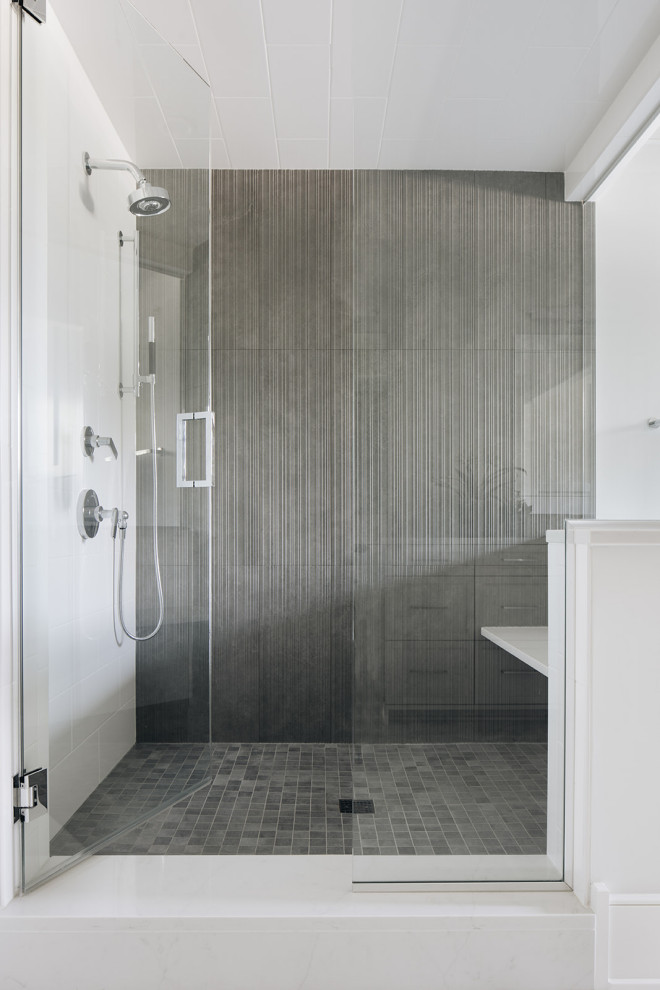 Mid-sized transitional master marble floor and white floor alcove shower photo in Chicago with gray walls, an undermount sink, quartz countertops, a hinged shower door and white countertops