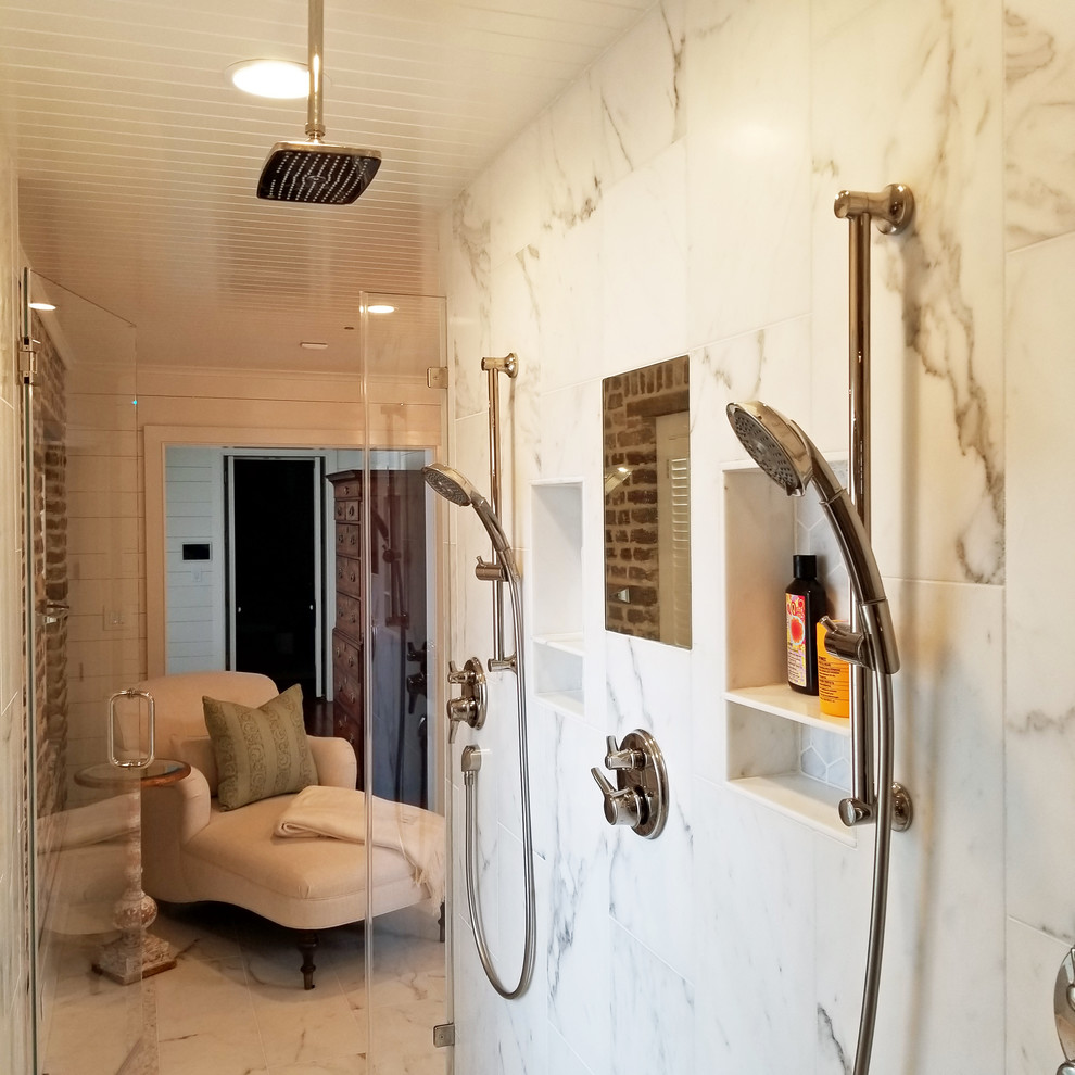 Photo of an expansive classic ensuite bathroom in Charleston with beaded cabinets, white cabinets, a freestanding bath, a double shower, a two-piece toilet, marble flooring, a submerged sink, marble worktops, white floors and a hinged door.
