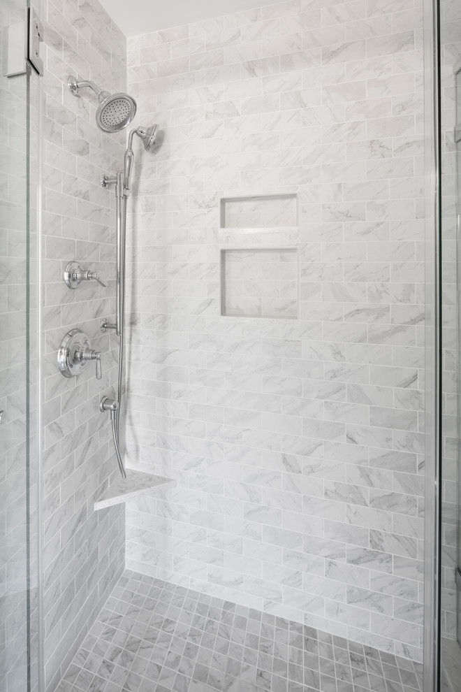 Example of a mid-sized transitional 3/4 gray tile, white tile and marble tile vinyl floor and gray floor corner shower design in Boston with shaker cabinets, white cabinets, a two-piece toilet, gray walls, an undermount sink, quartzite countertops and a hinged shower door