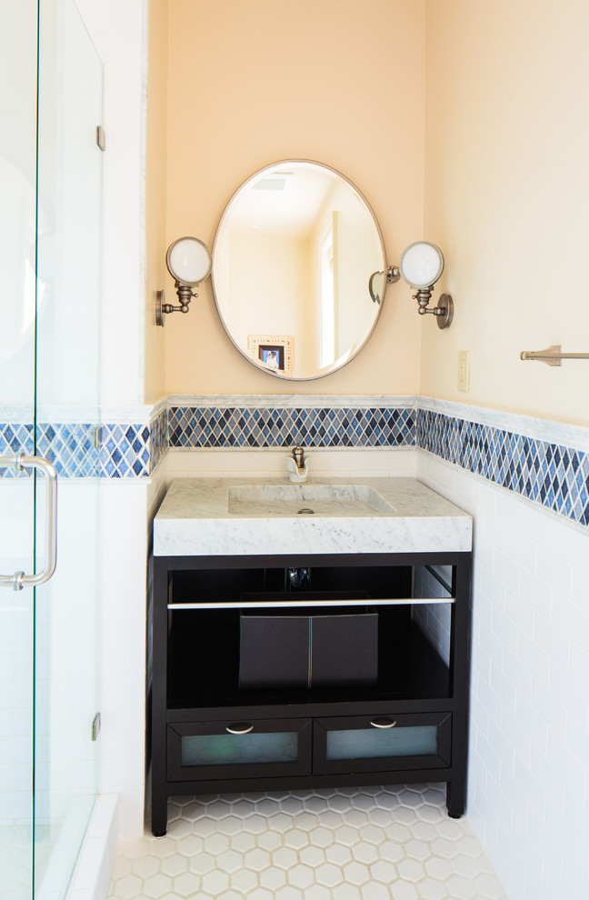 Bathroom - traditional bathroom idea in Other with a console sink