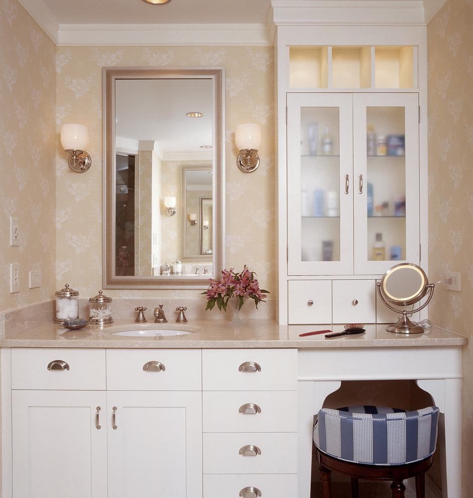 This is an example of a traditional bathroom in Portland Maine with marble worktops.