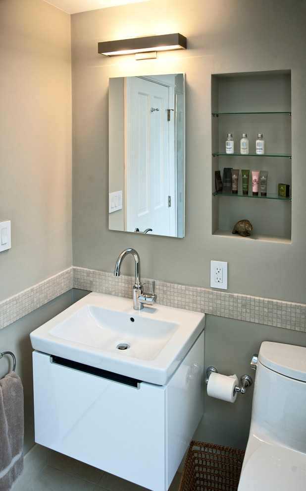 Inspiration for a small contemporary bathroom remodel in Boston with a wall-mount sink and a one-piece toilet