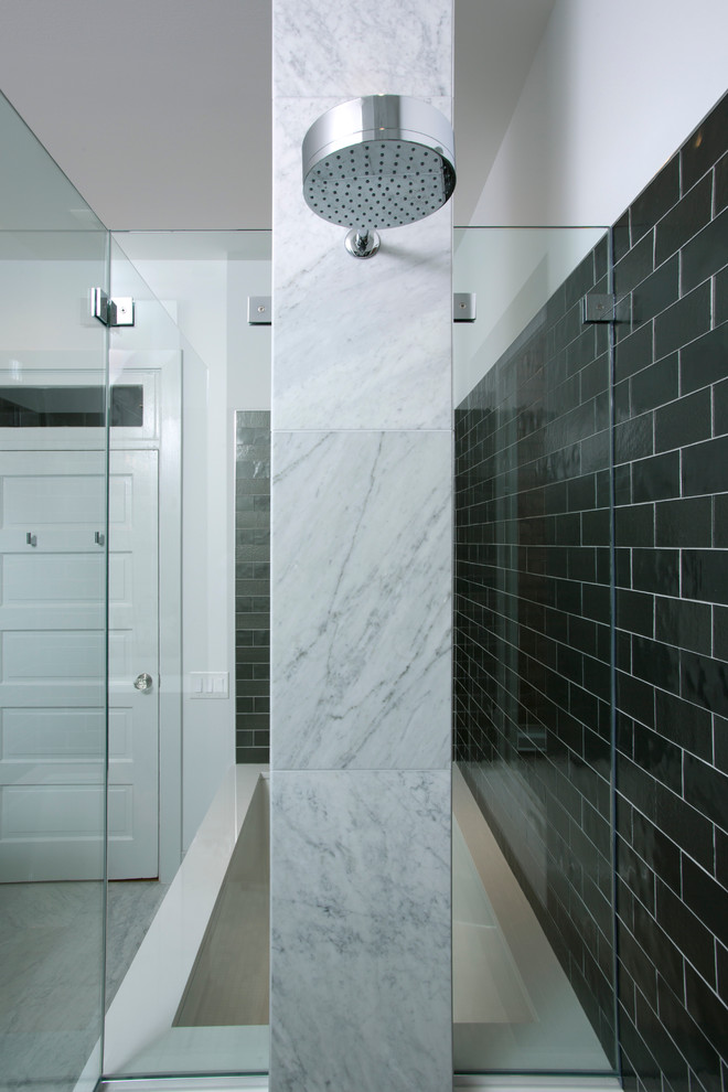 Bathroom - mid-sized contemporary master black tile, gray tile, white tile and stone tile marble floor bathroom idea in DC Metro with flat-panel cabinets, gray cabinets, a one-piece toilet, white walls, an undermount sink and solid surface countertops