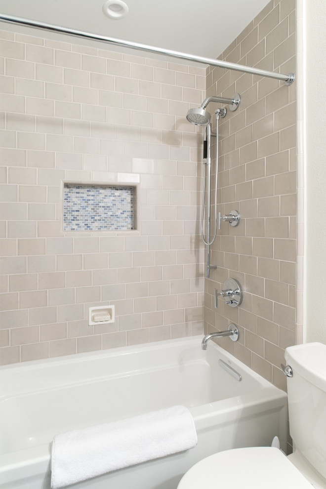 Inspiration for a mid-sized 1960s master gray tile and ceramic tile limestone floor and gray floor alcove shower remodel in San Diego with shaker cabinets, beige cabinets, a two-piece toilet, white walls, an undermount sink, quartz countertops and a hinged shower door