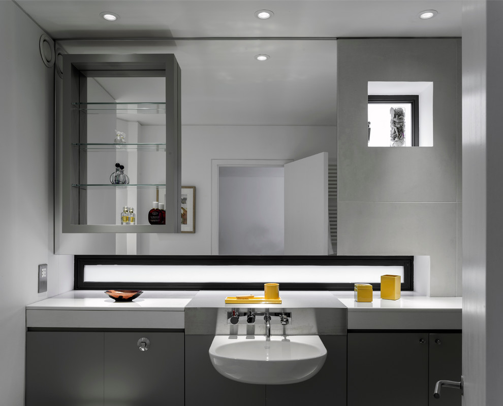 Inspiration for a contemporary bathroom in London with feature lighting.