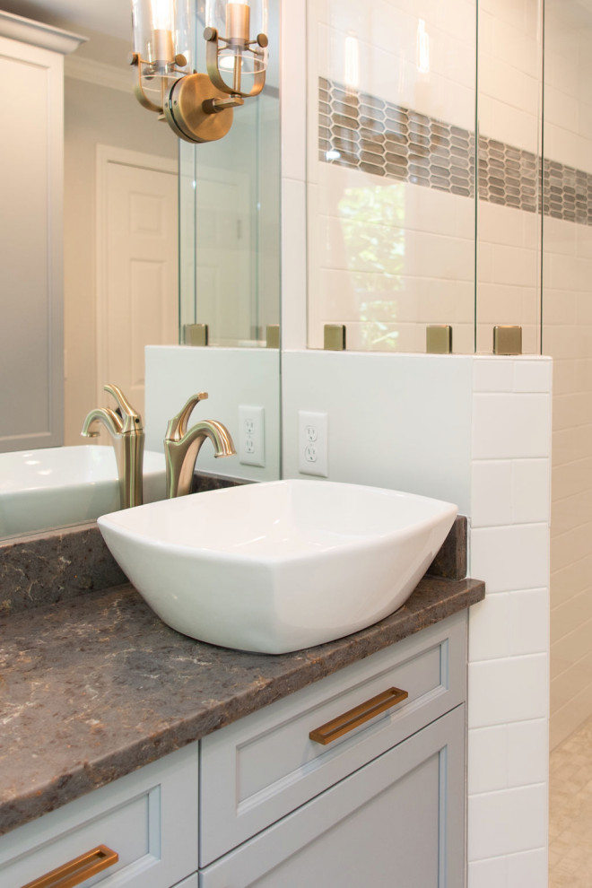 Small transitional master white tile and glass tile porcelain tile, gray floor and double-sink double shower photo in Other with shaker cabinets, gray cabinets, a two-piece toilet, gray walls, a vessel sink, quartz countertops, a hinged shower door, multicolored countertops and a freestanding vanity