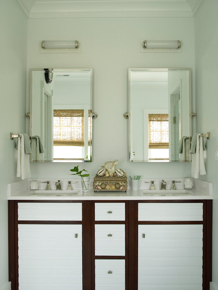 Large beach style ensuite bathroom in Jacksonville with beaded cabinets, white cabinets, multi-coloured tiles, green walls, a built-in sink and marble worktops.