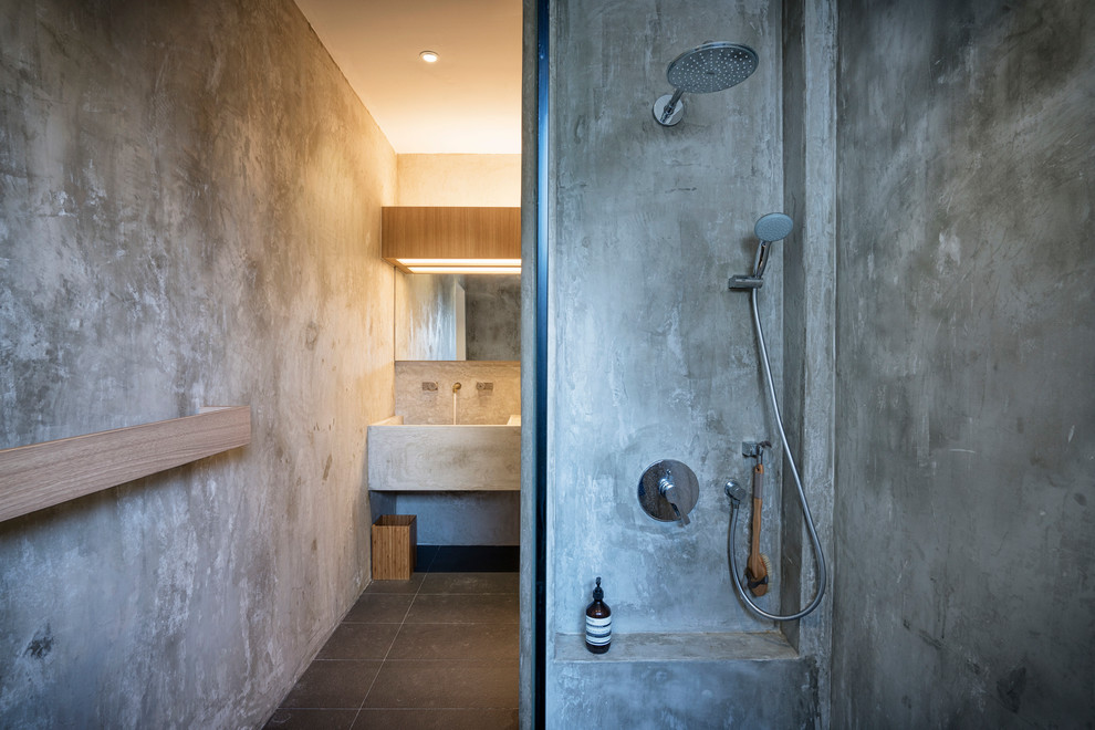 Diseño de cuarto de baño cemento industrial