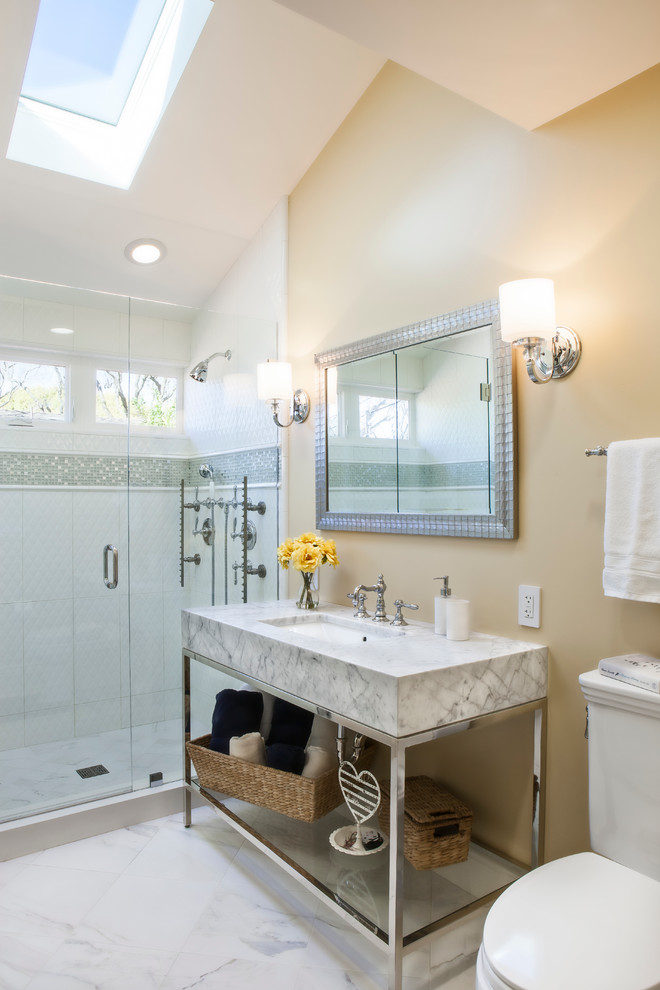 Inspiration for a medium sized classic ensuite bathroom in San Francisco with a console sink, an alcove shower, white tiles, beige walls, a two-piece toilet, marble flooring, marble worktops, white floors, a hinged door and white worktops.