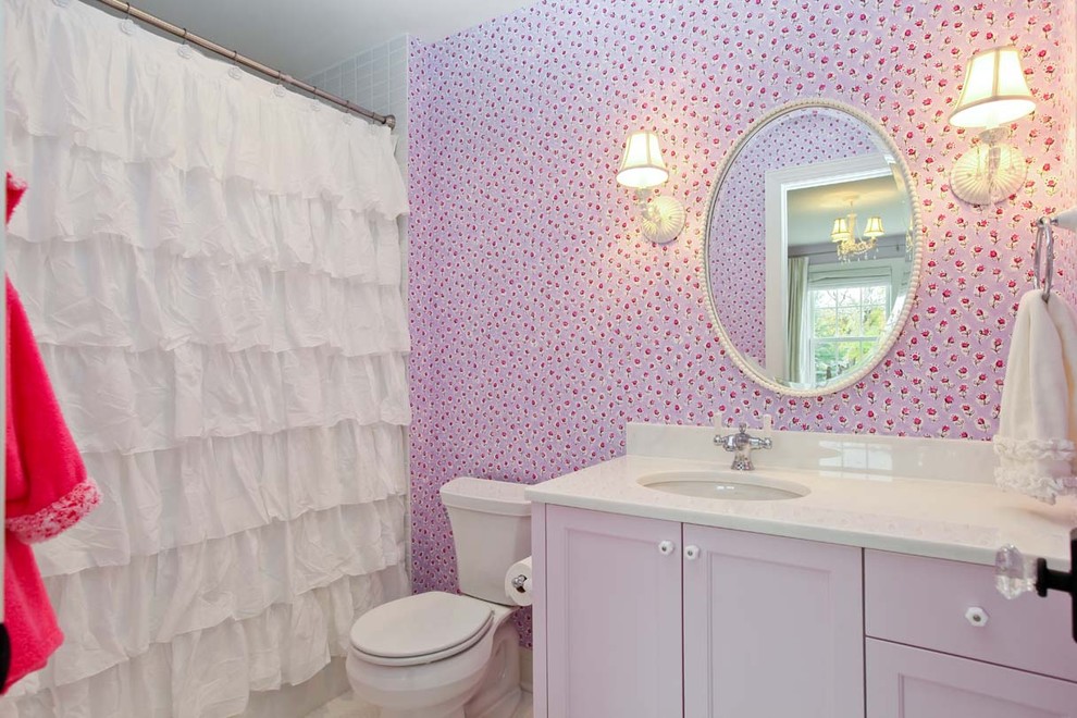 Romantic bathroom in Minneapolis with a submerged sink, recessed-panel cabinets, an alcove bath, a shower/bath combination, a two-piece toilet and white tiles.