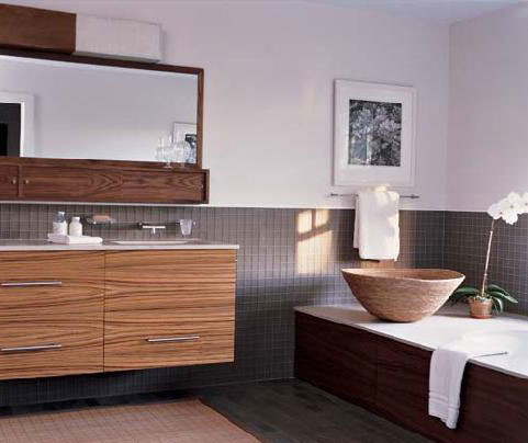 Inspiration pour une salle de bain principale design en bois brun de taille moyenne avec un placard à porte plane, une baignoire d'angle, un mur multicolore, parquet foncé et un plan de toilette en granite.